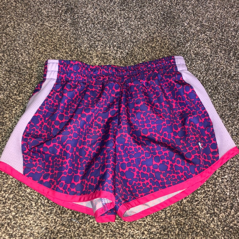 Danskin Now purple and pink swishy shorts